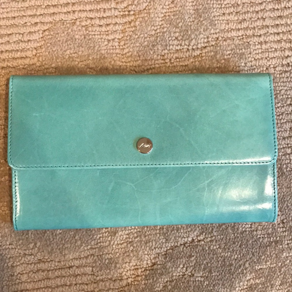 Turquoise travel clutch